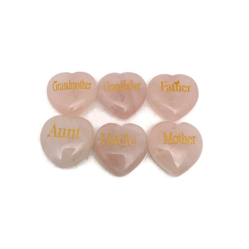 Rose quartz engraved crystal family heart by GemstoneGO, featuring a polished pink stone with engraved family design, perfect for healing and gifting.