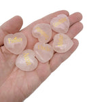 Rose quartz engraved crystal family heart from GemstoneGO, featuring a polished healing crystal with engraved family design.