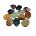 Teardrop-shaped natural worry stone from GemstoneGO, soothing crystal gemstone for relaxation, measuring 4.5x3.5cm.
