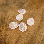 Rose quartz worry stone from GemstoneGO, 45mm soothing crystal with smooth polished surface for calming and stress relief.