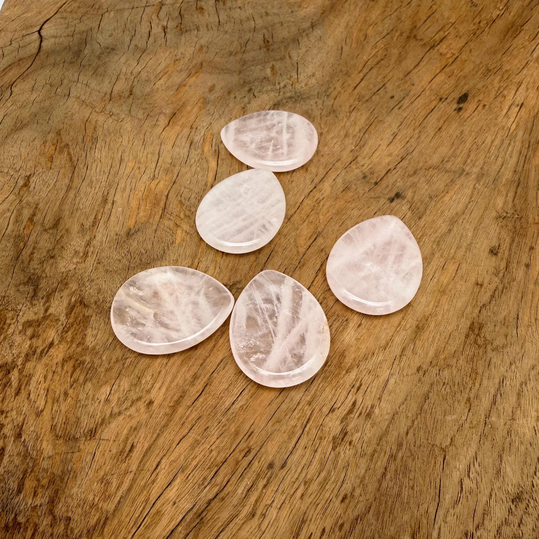 Rose quartz worry stone from GemstoneGO, 45mm soothing crystal with smooth polished surface for calming and stress relief.