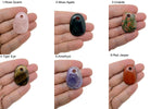 Oval crystal pendant from GemstoneGO, natural stone jewelry bead with a polished finish and mixed colors, ideal for jewelry making.