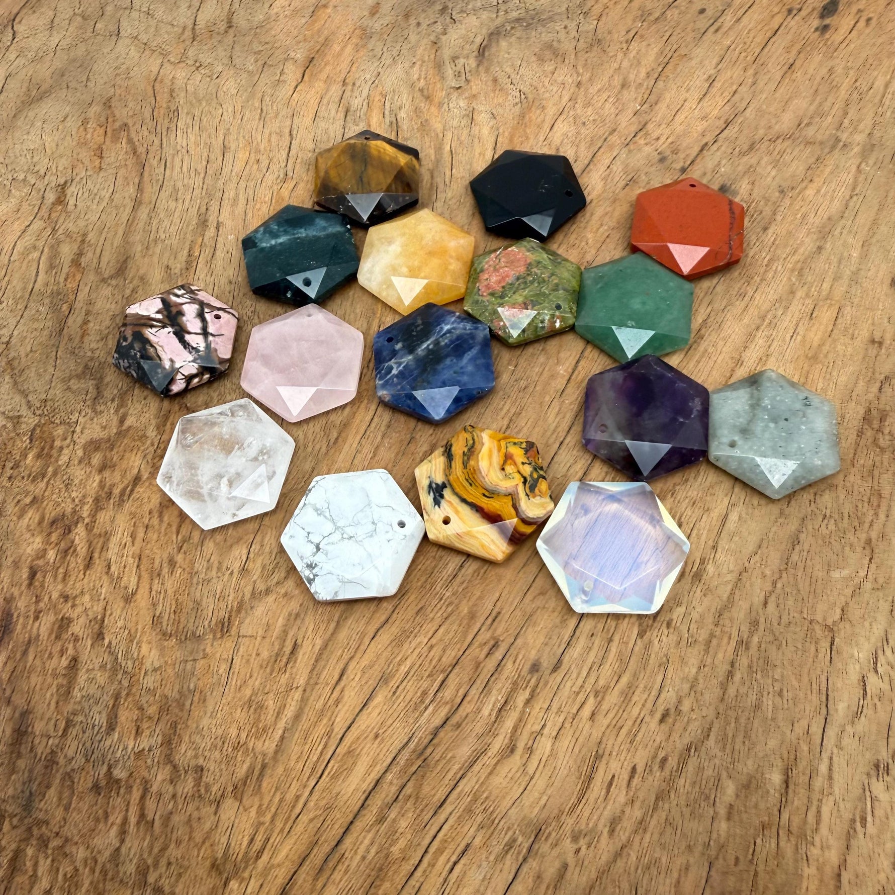 Faceted hexagon crystal pendant necklace bead in assorted colors from GemstoneGO, showcasing a sparkling gemstone charm.