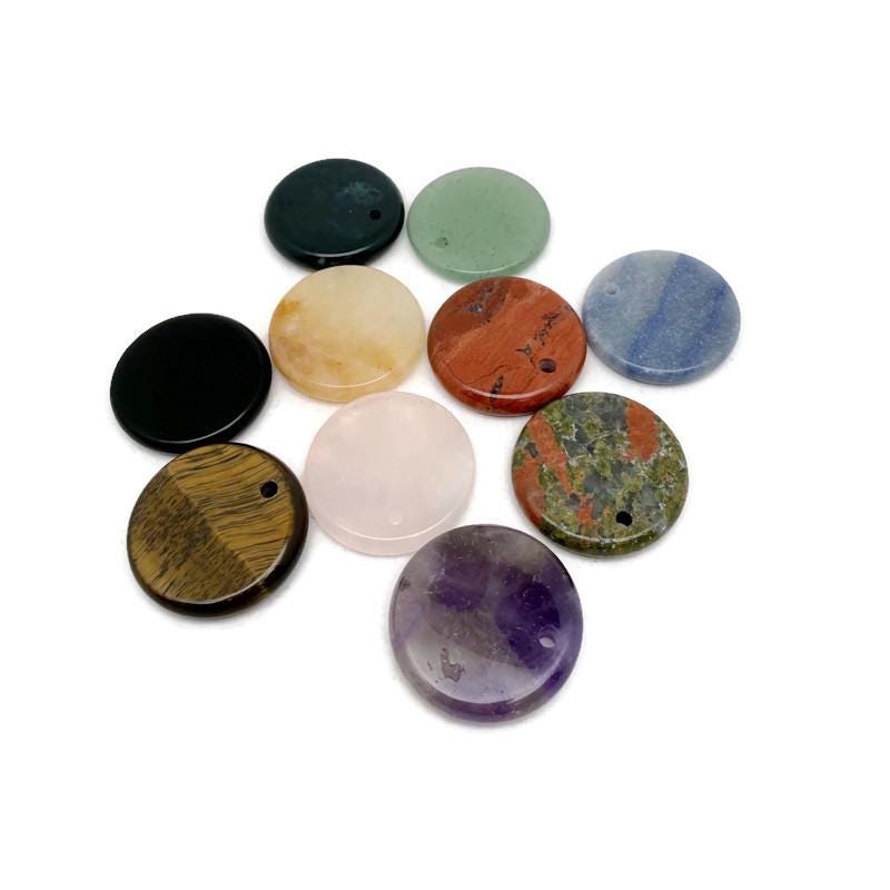 Round gemstone pendant featuring a drilled natural crystal disc charm from GemstoneGO, showcasing vibrant colors and intricate details.