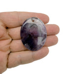 Healing worry crystal pendant featuring a natural stone on a cord, part of GemstoneGO's gemstone jewelry collection.