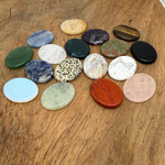 Healing worry crystal pendant made of natural stone jewelry with a silver chain, designed for calming and stress relief.