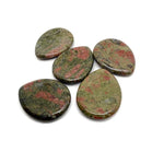 Unakite worry stone from GemstoneGO, 45mm smooth crystal with natural green and pink hues, used for calming and stress relief.