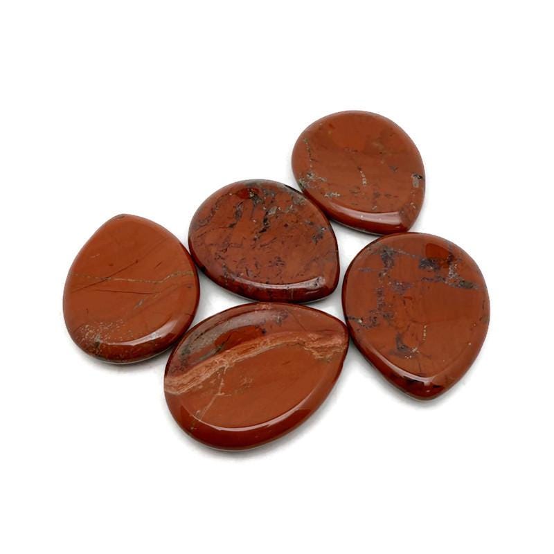 Red Jasper worry stone with smooth 45mm polished surface, featuring natural red and earthy tones, from GemstoneGO.