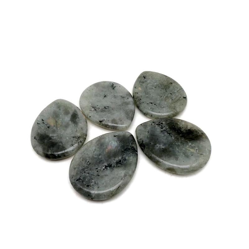 Labradorite worry stone from GemstoneGO, a 45mm soothing crystal with iridescent gray and blue hues, used for calming and meditation.