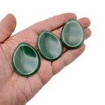 Aventurine worry stone from GemstoneGO, 45mm soothing crystal with polished smooth surface and natural green color.