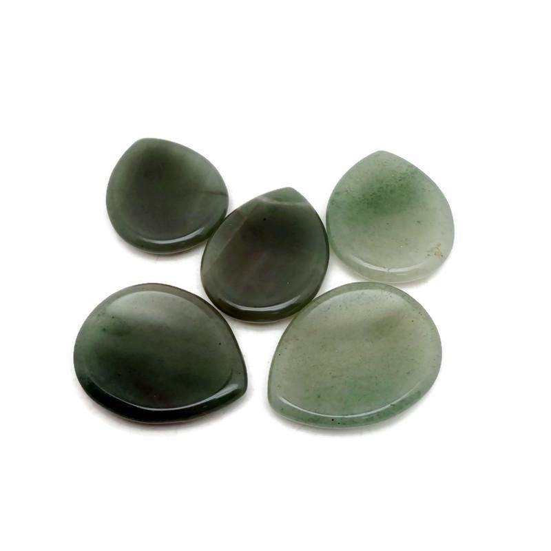 A 45mm green aventurine worry stone from GemstoneGO, smooth polished crystal for stress relief and calming purposes.