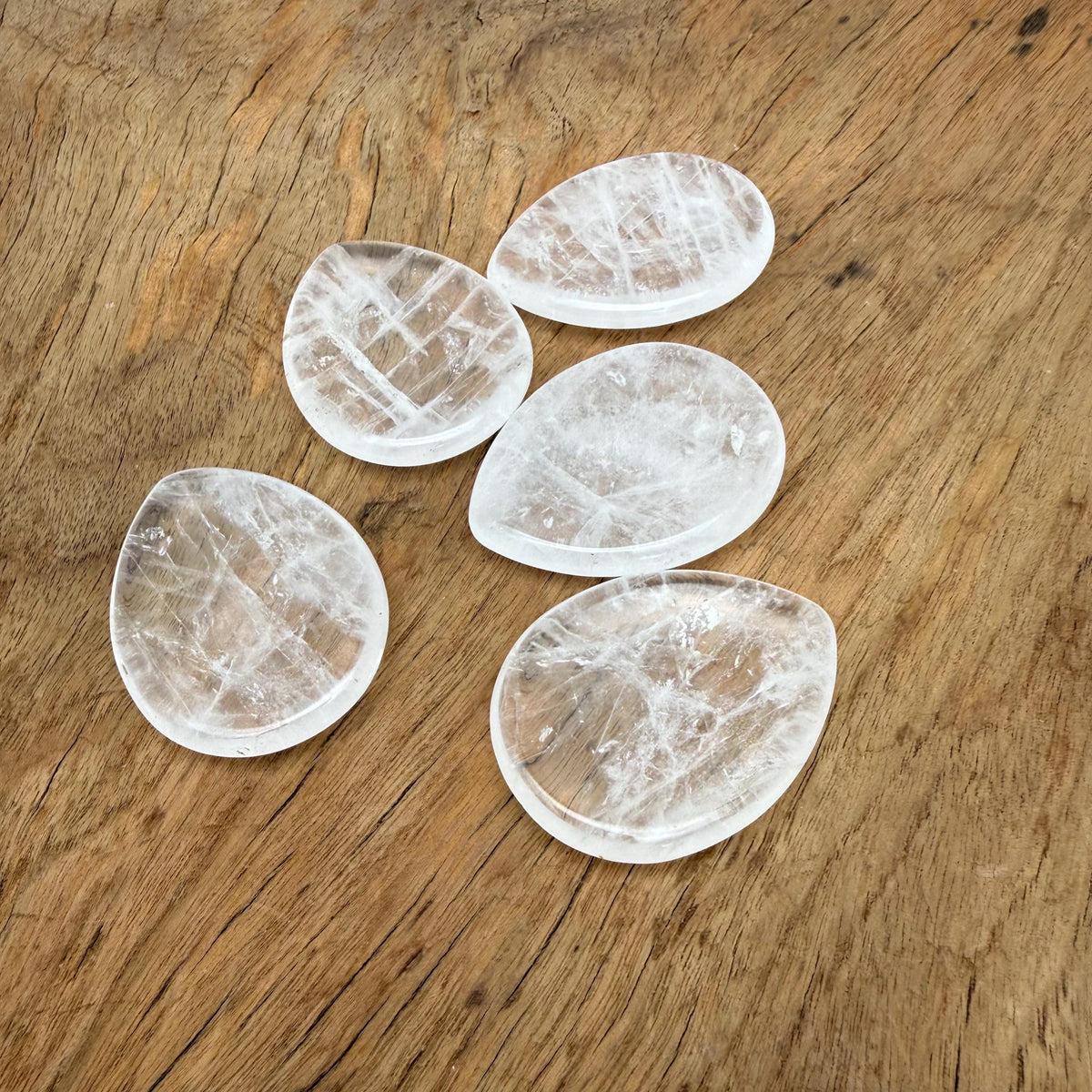 Clear Quartz worry stone from GemstoneGO, 45mm soothing crystal with smooth, polished surface for stress relief and meditation.