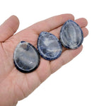 Sodalite worry stone from GemstoneGO, 45mm soothing crystal with polished blue and white mineral patterns for stress relief.