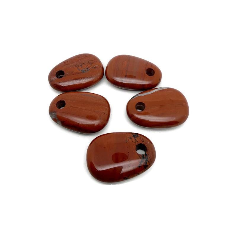 Red Jasper oval crystal pendant from GemstoneGO featuring a polished natural stone bead for jewelry making.