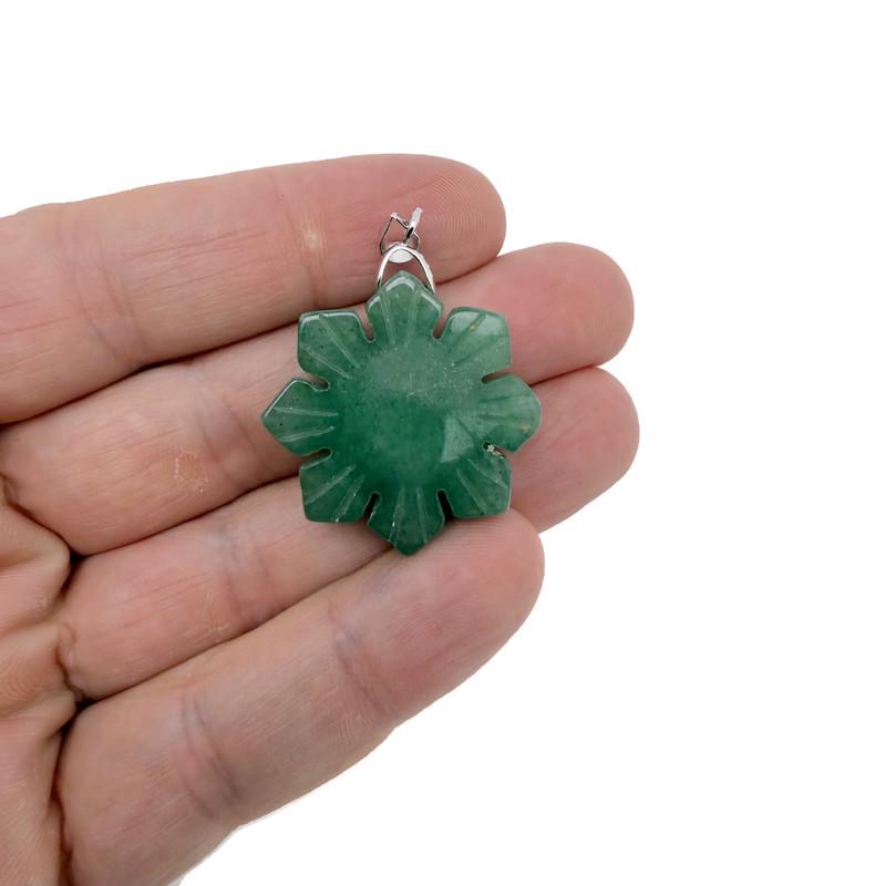 Aventurine gemstone pendant with polished green stone and silver bail, showcasing a healing gemstone jewelry piece.