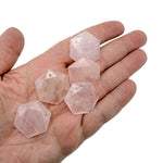 Faceted rose quartz hexagon crystal pendant necklace with a smooth gemstone bead, showcasing a natural pink gemstone from GemstoneGO.