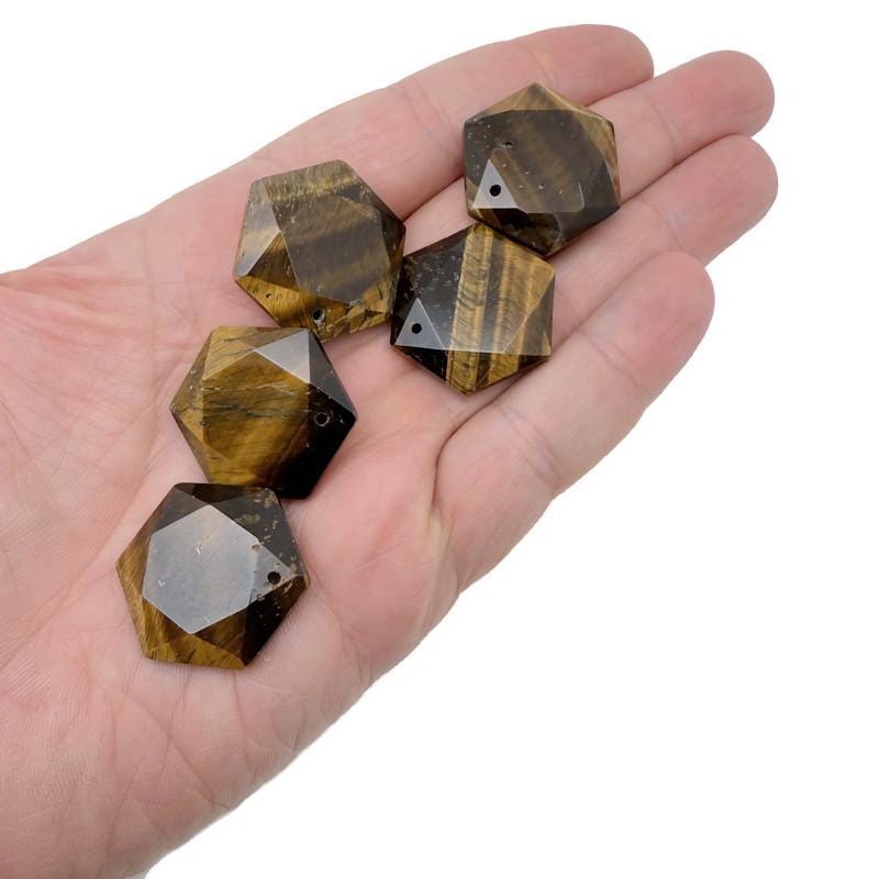 Faceted tiger eye hexagon crystal pendant necklace with a polished gemstone bead from GemstoneGO, showcasing warm golden-brown hues.