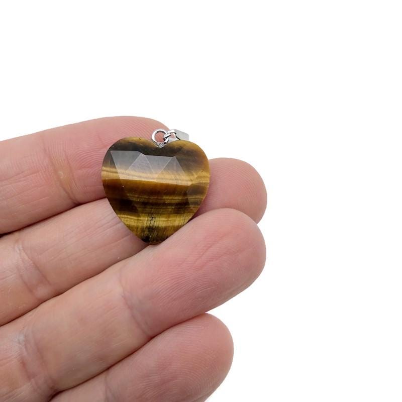 Tiger Eye faceted heart crystal pendant by GemstoneGO, showcasing a natural gemstone with a polished, heart-shaped design.