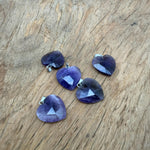 Faceted amethyst heart-shaped crystal pendant from GemstoneGO, showcasing natural purple gemstone with silver bail attachment.