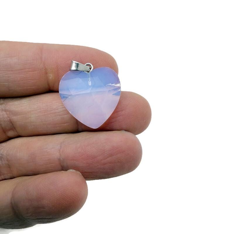 Opalite faceted heart crystal pendant from GemstoneGO, natural crystal charm with a polished faceted heart shape.
