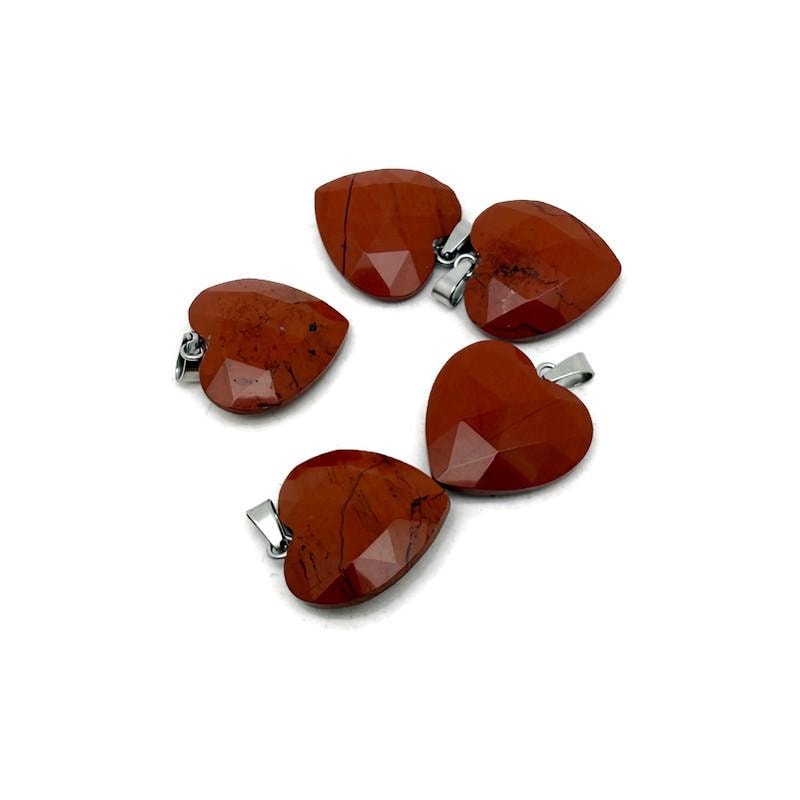 Red Jasper faceted heart crystal pendant from GemstoneGO, featuring a natural gemstone with a polished, heart-shaped design.