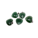 A faceted aventurine heart crystal pendant with natural gemstone charm, showcasing a polished green gemstone with intricate facets.