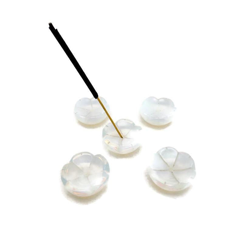 Opalite crystal flower-shaped incense holder from GemstoneGO, designed for cleansing and relaxation with a smooth, polished surface.