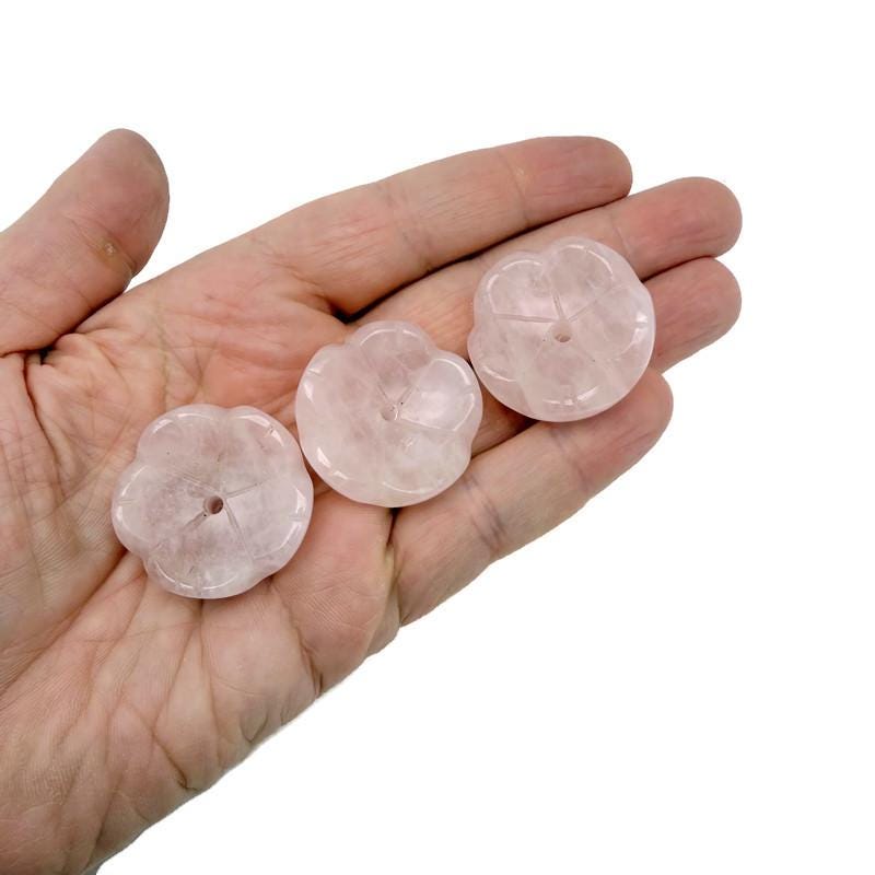 Rose quartz crystal flower-shaped incense holder by GemstoneGO, designed for cleansing and relaxation.