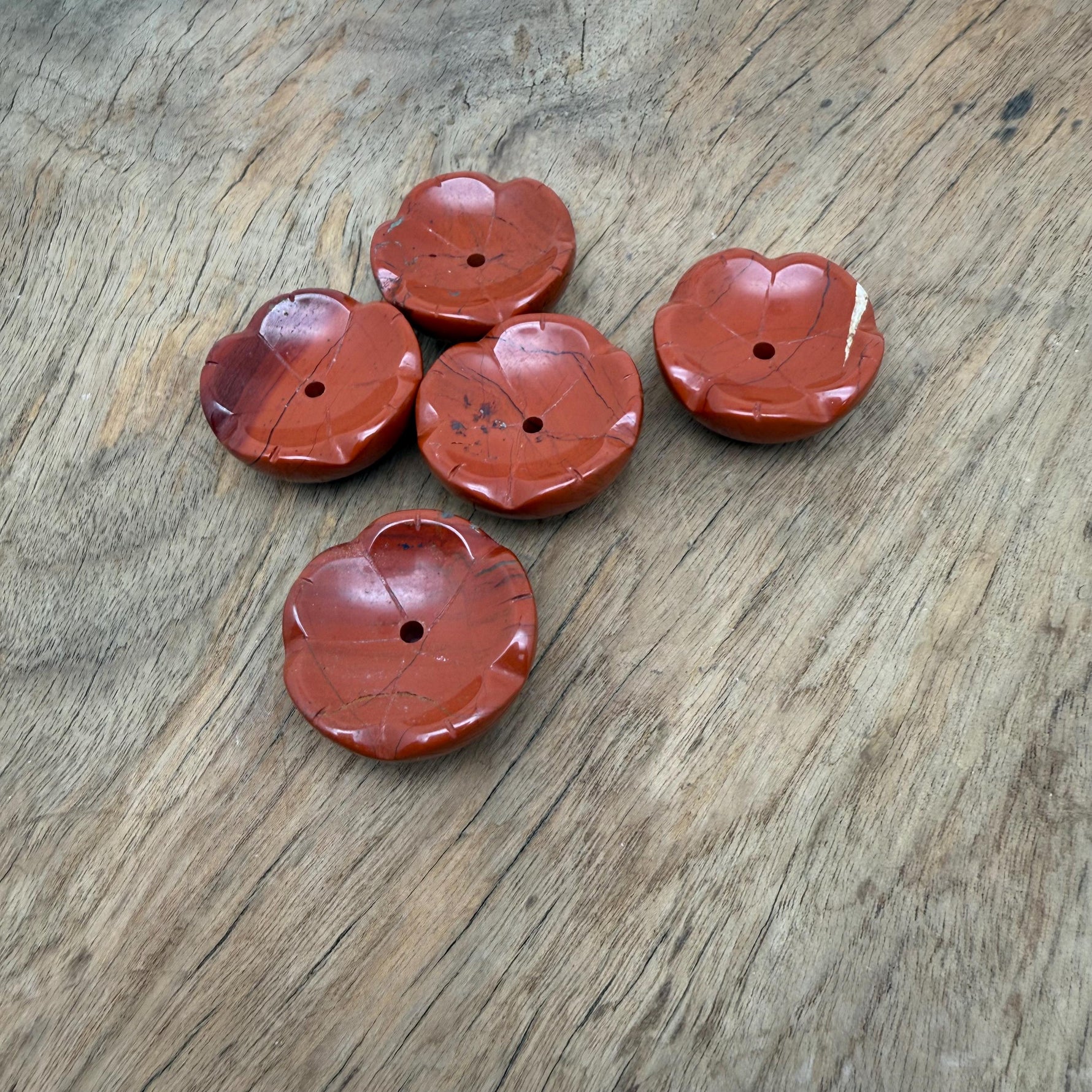 Red Jasper crystal flower incense holder by GemstoneGO for cleansing and relaxation, featuring a detailed flower design.