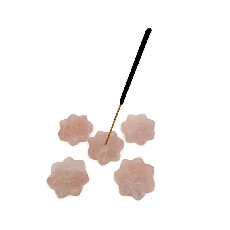 Rose quartz crystal flower incense holder by GemstoneGO, carved gemstone stick burner for meditation and spiritual relaxation.