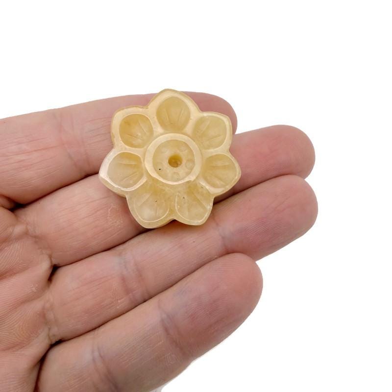 Yellow jade crystal flower incense holder by GemstoneGO, carved gemstone stick burner for meditation and aromatic incense burning.