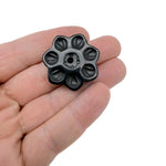 Obsidian crystal flower incense holder with carved design, gemstone stick burner for meditation and relaxation.