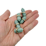 Amazonite double terminated crystal pendant from GemstoneGO featuring a natural gemstone point with blue-green hues.