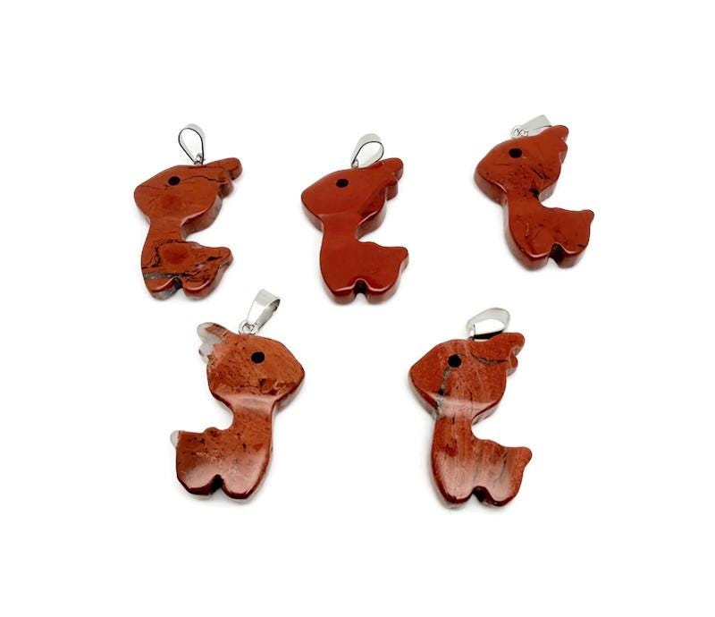 Red Jasper deer crystal pendant necklace featuring a gemstone deer charm on a silver chain by GemstoneGO.