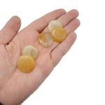 Round yellow jade flat gemstone slab, 25mm, showcasing smooth polished surface and vibrant yellow color from GemstoneGO.