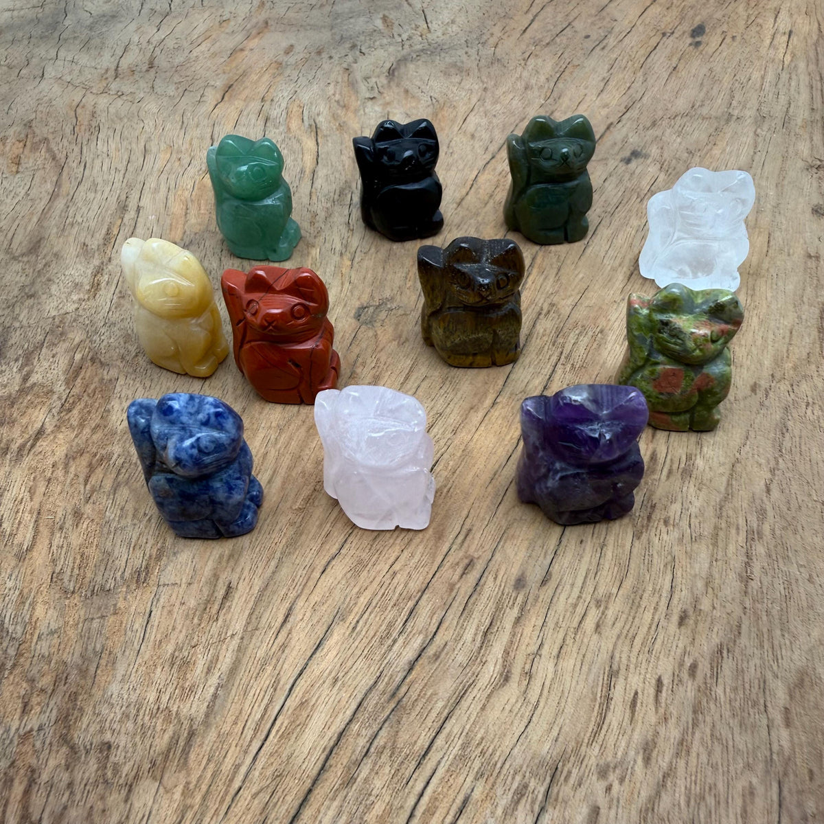 Handmade carved crystal cat animal figure from GemstoneGO, 30mm, featuring a colorful mix of gemstones and intricate details.
