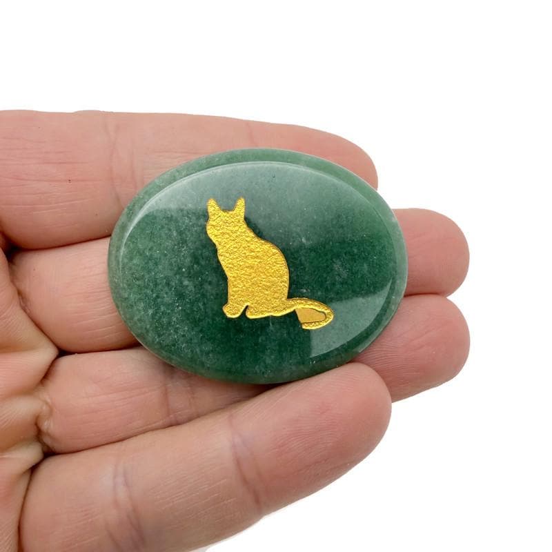 Gold crystal totem stone with engraved animal design from GemstoneGO, showcasing a polished, decorative gemstone sculpture.