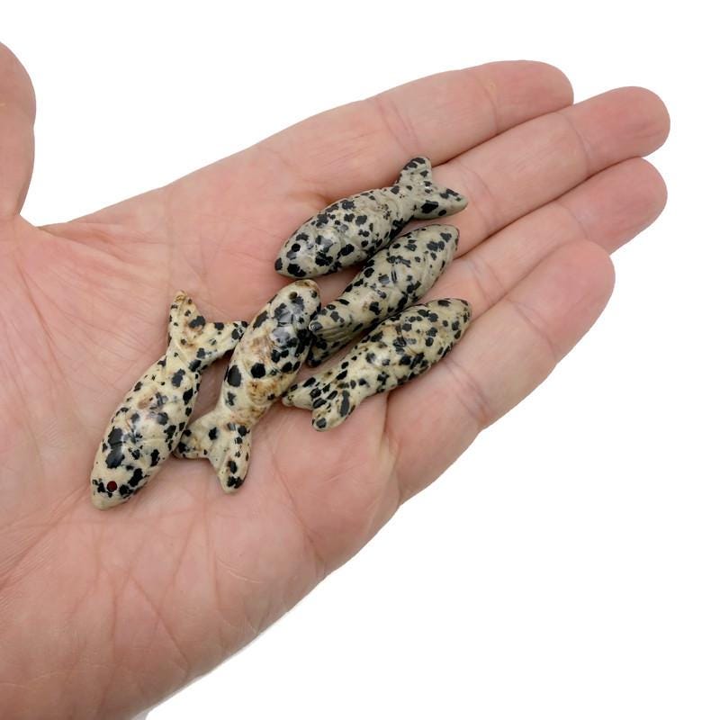 Dalmatian Jasper fish pendant from GemstoneGO featuring a unique spotted gemstone design, perfect as a lucky fishing charm.