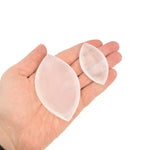 Polished Selenite leaf-shaped gemstone plate by GemstoneGO, carved crystal dish for home decor and display.