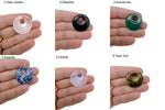 Polished 30mm crystal donut from GemstoneGO featuring a Pi stone design, used for healing and spiritual energy.