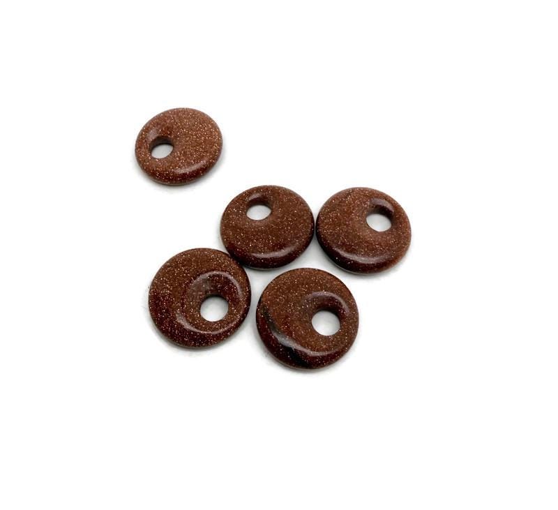 Dona de cristal Goldstone - Piedra Pi - 20mm - DO1077