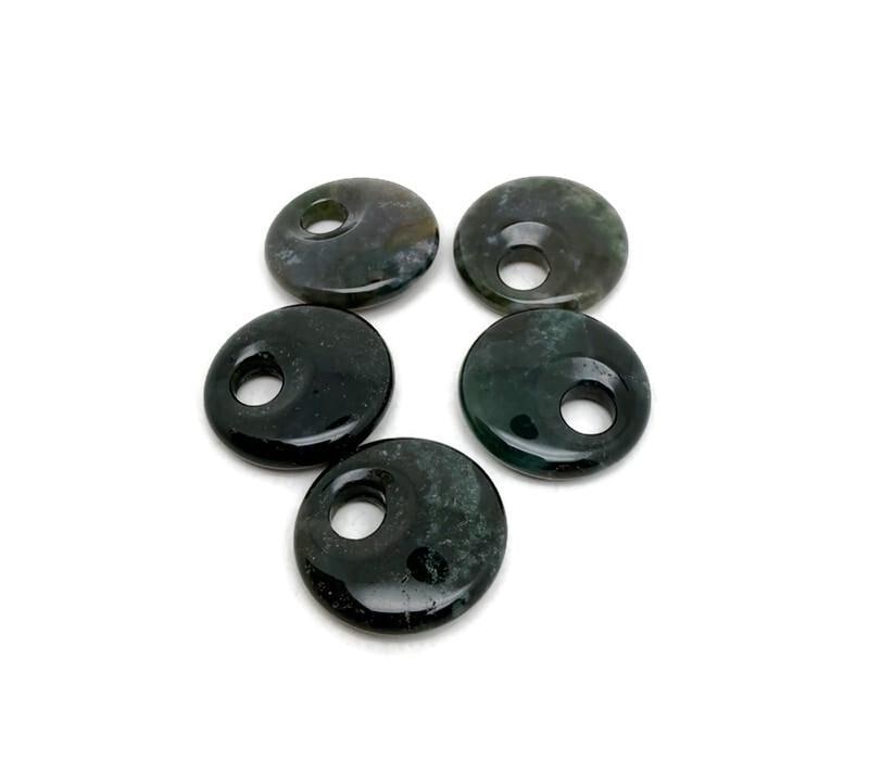 Moss agate crystal donut pendant, 30mm Pi stone, natural green and brown gemstone with intricate moss-like patterns.