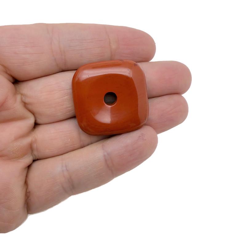 Red Jasper square crystal donut with Pi stone design, 30mm gemstone from GemstoneGO, polished and detailed for spiritual use.