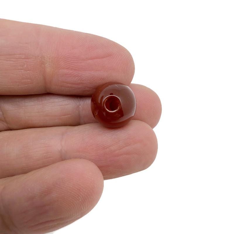 Round crystal beads from GemstoneGO, 12mm DIY jewelry making gemstone pack with a colorful mix of sparkling gemstones.
