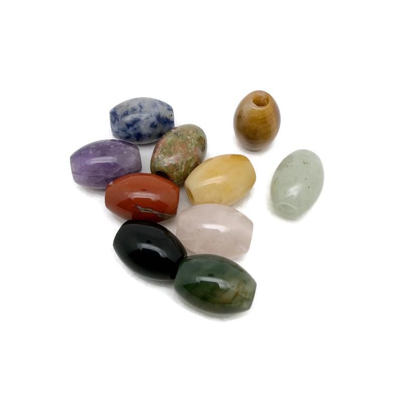 Oval crystal beads from GemstoneGO, 18mm mixed colors, ideal for bracelet and necklace making, shown in a close-up image.
