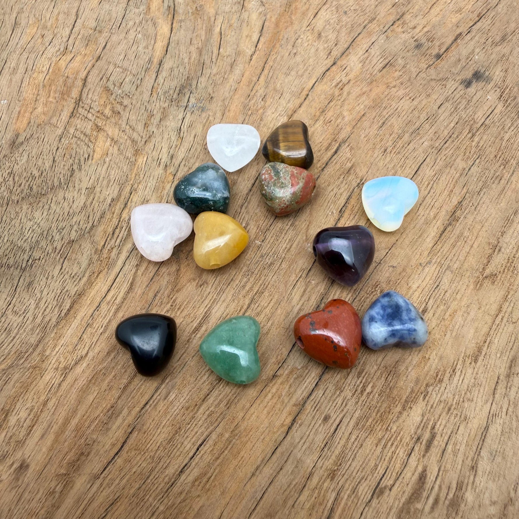 Mini Heart Crystal Beads by GemstoneGO, 12mm mix of drilled heart-shaped beads for bracelet and necklace designs.