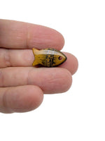 Fish-shaped crystal pendant from GemstoneGO featuring a healing stone design, perfect for jewelry or charms.