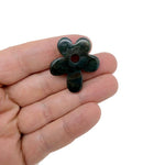 Carved crystal flower gemstone pendant with colorful gemstone accents, featuring a floral charm design by GemstoneGO.