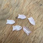 Rose quartz fish-shaped crystal pendant with a silver bail, featuring a smooth, polished healing stone in a fish charm design.