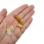 Yellow jade fish-shaped crystal pendant with healing stone charm for jewelry, featuring a vibrant yellow color and detailed fish design.